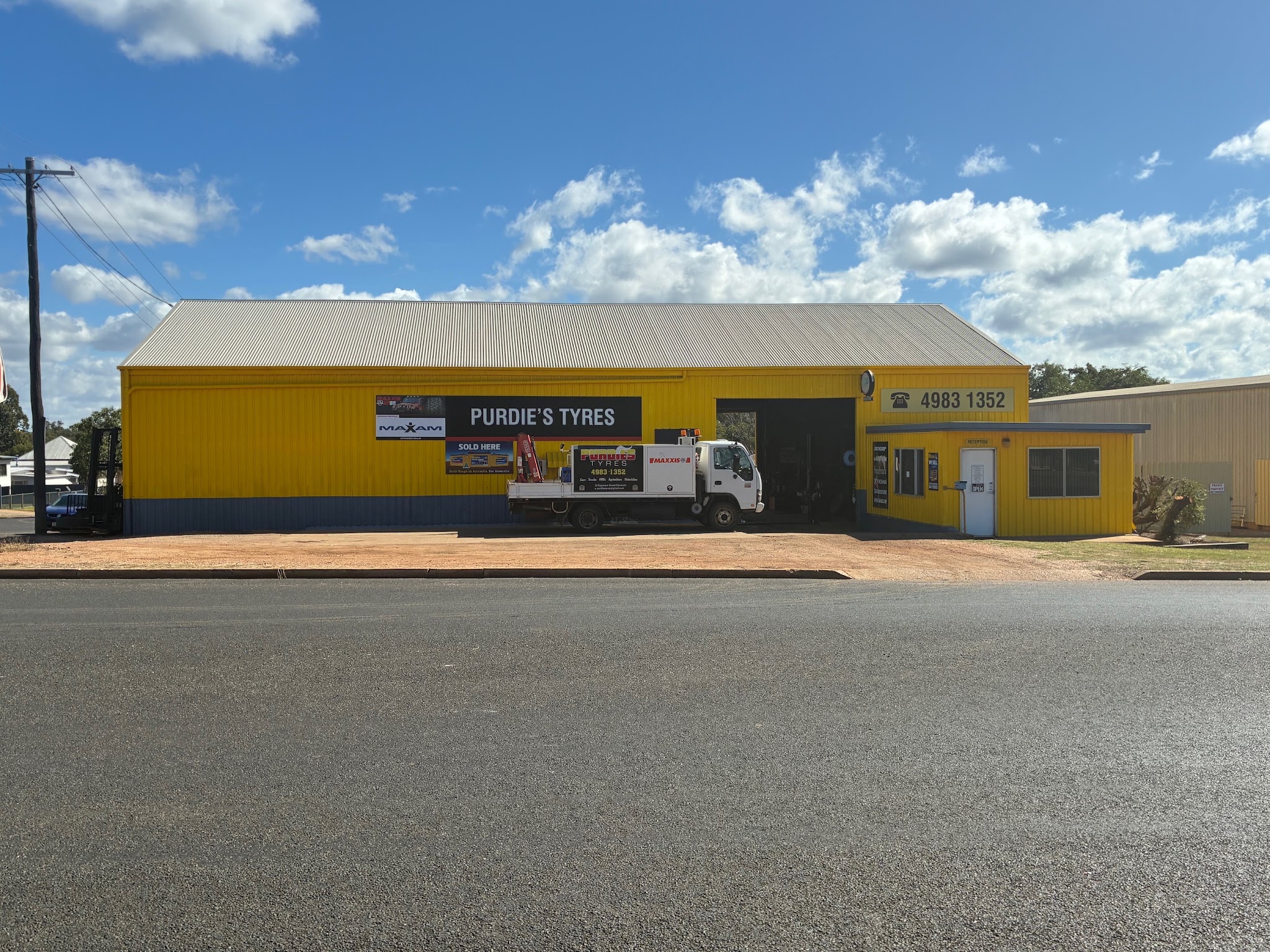 The Purdie's Tyres workshop on Capricorn Street, Clermont, with the service truck parked out the front
